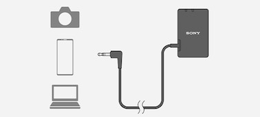 Imagen de un receptor conectado mediante un cable de audio y un miniconector de 3,5 mm a varios dispositivos, como smartphones y PC